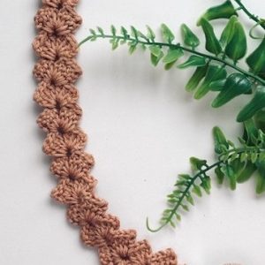 Attache tétine marron